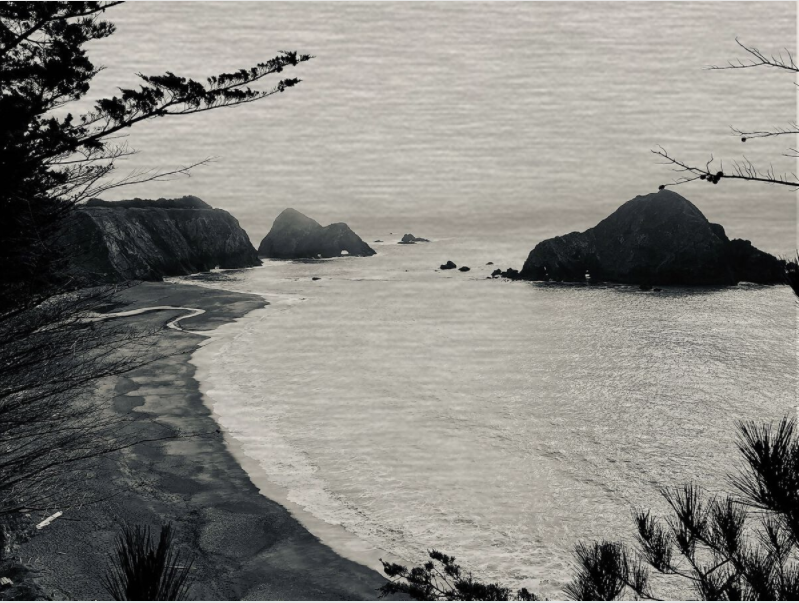 A black and white photo of the ocean.