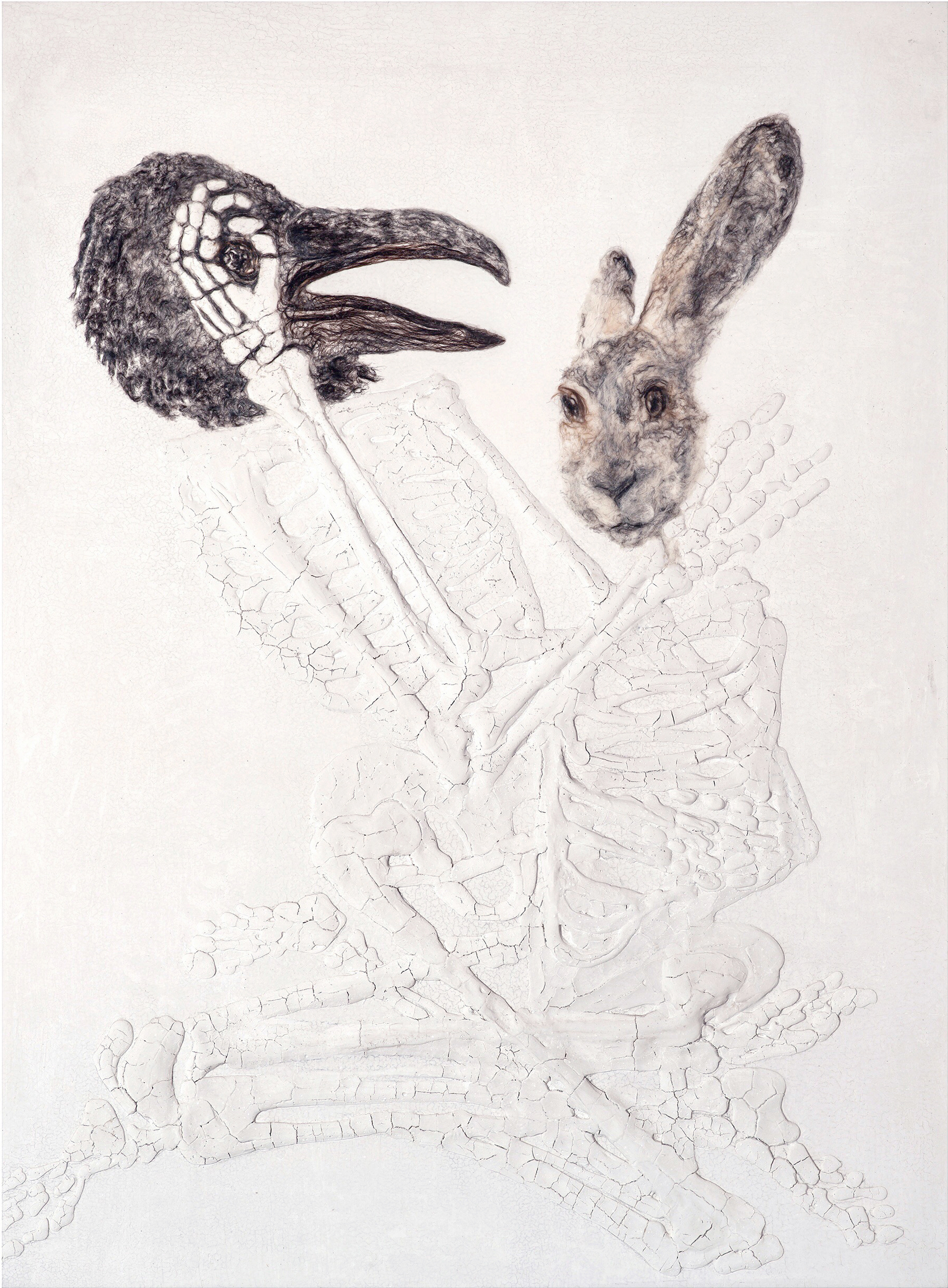 A drawing of an animal and bird with a rabbit.