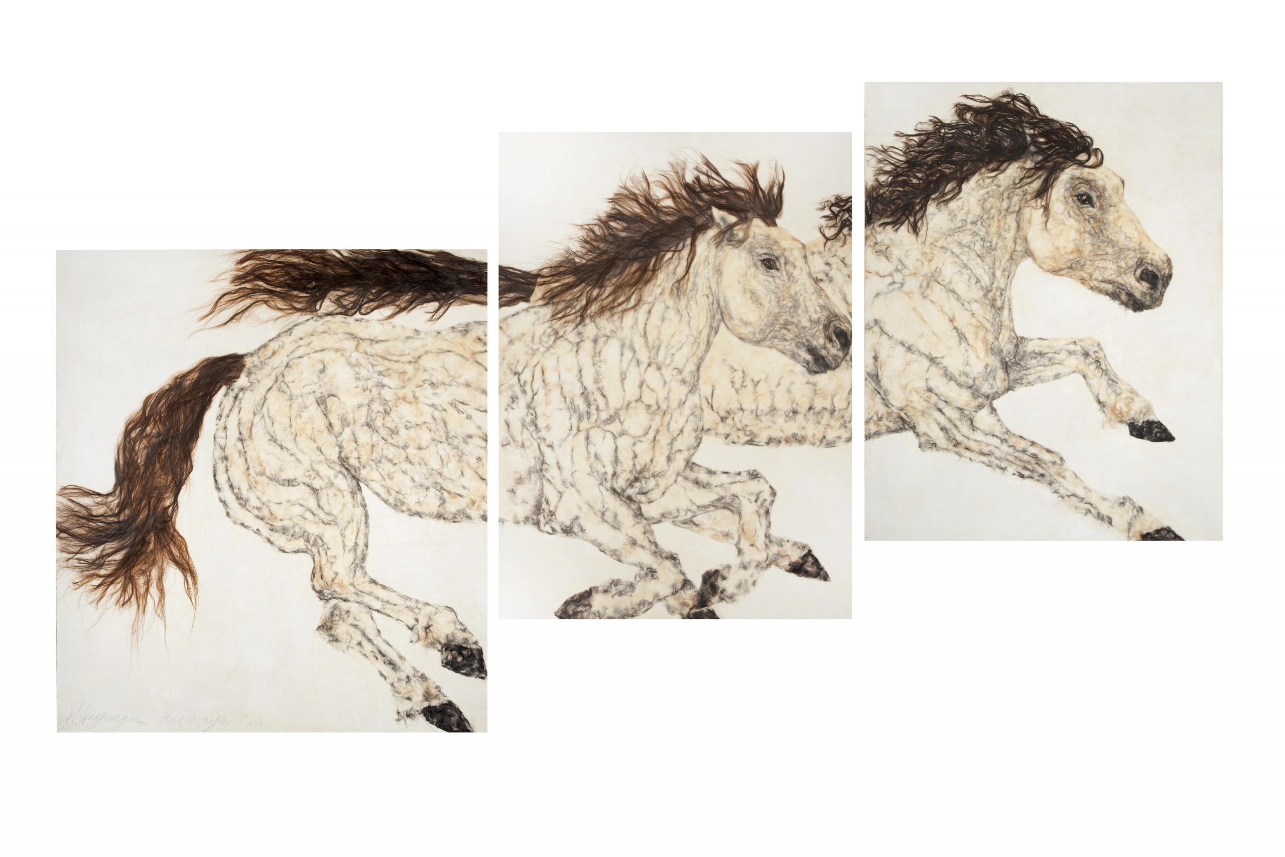 A triptych of horses running in the wind.